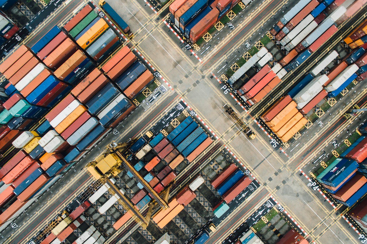 Shipping containers at a transport facility